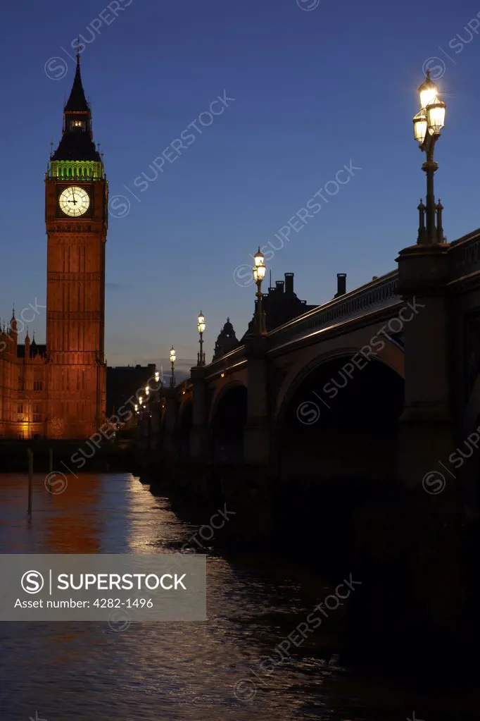 England, London, South Bank. Houses of Parliament at night viewed from the South Bank.
