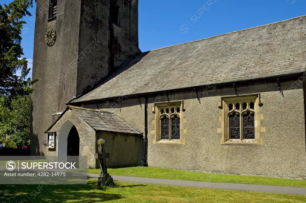 England, Cumbria, Grasmere. St. Oswald's Church in Grasmere. The churchyard is famous for the Wordsworth family tomb.