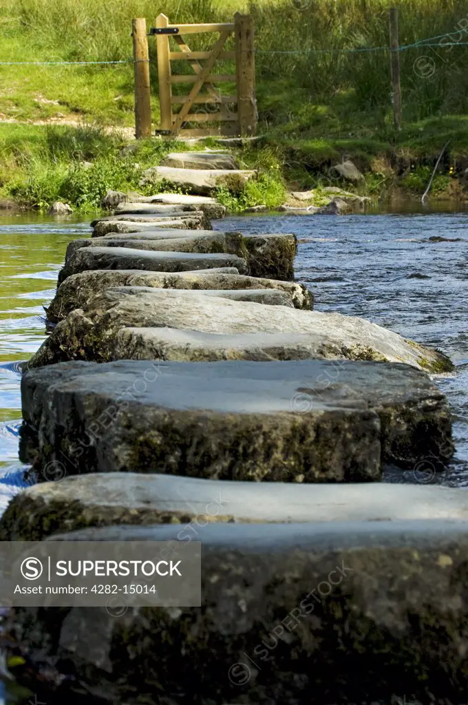 England, Cumbria, near Ambleside. Close up of the stepping stones across the River Rothay near Ambleside.