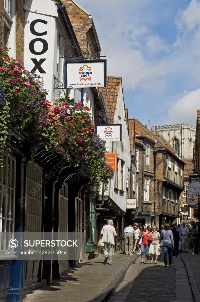 England, North Yorkshire, York. People shopping in The Shambles, often called Europe's best preserved medieval street.
