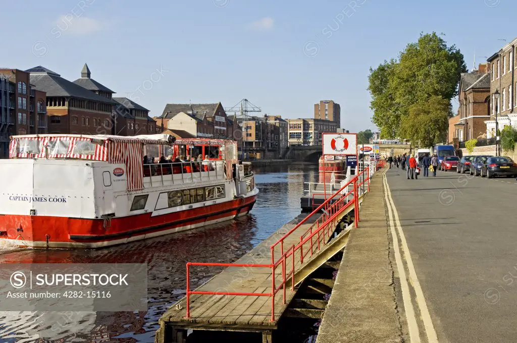 England, North Yorkshire, York. A YorkBoat sightseeing boat leaving the landing at King's Staith on the River Ouse.