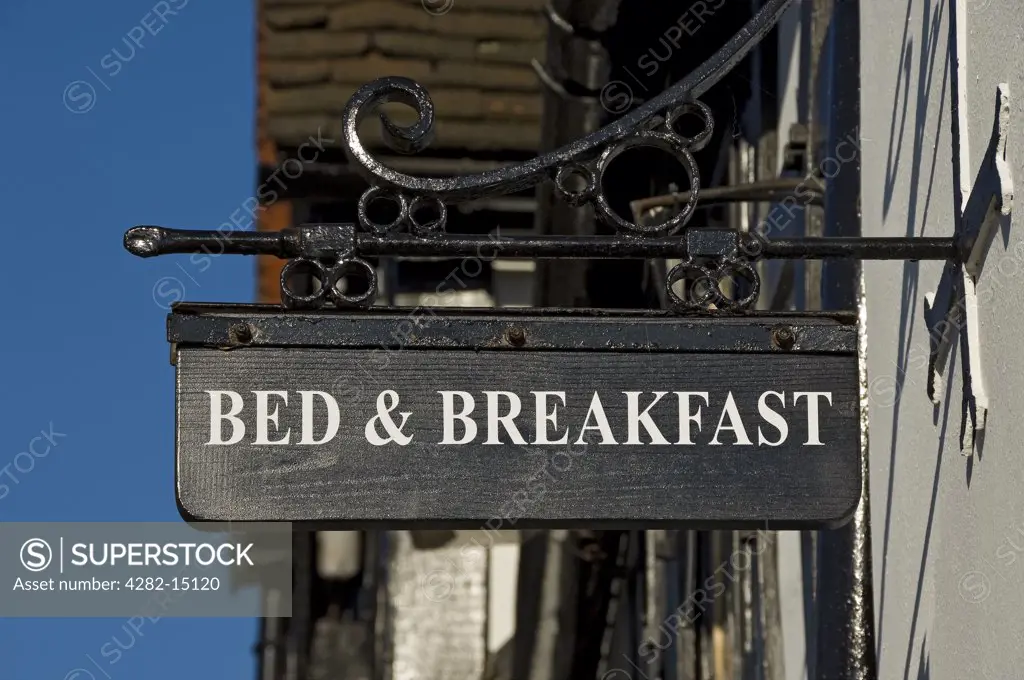England, North Yorkshire, York. A bed & breakfast sign hanging outside a pub.