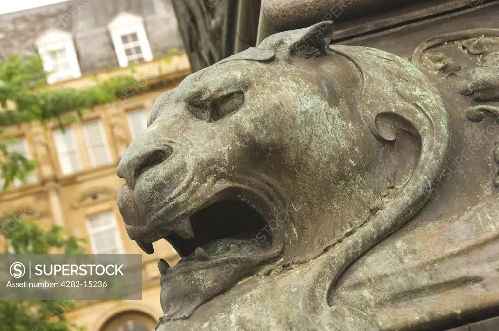 England, West Yorkshire, Leeds. Lion at the base of the statue of Edward, Prince of Wales, the Black Prince, in Leeds City Square.