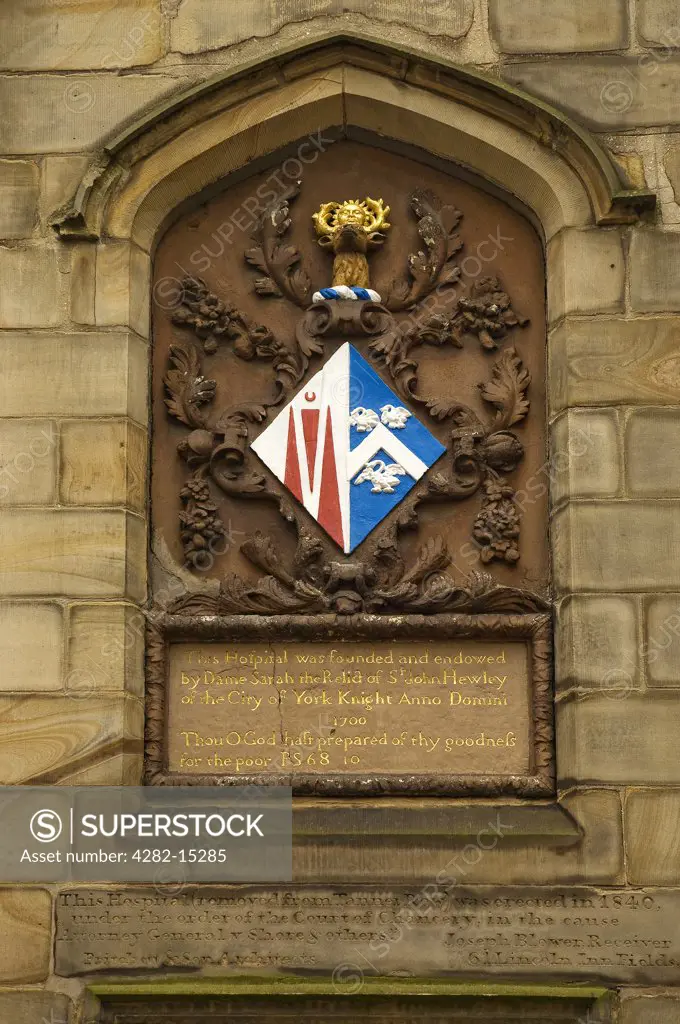 England, North Yorkshire, York. Coat of arms on Lady Hewley's Almshouses in St Saviourgate.