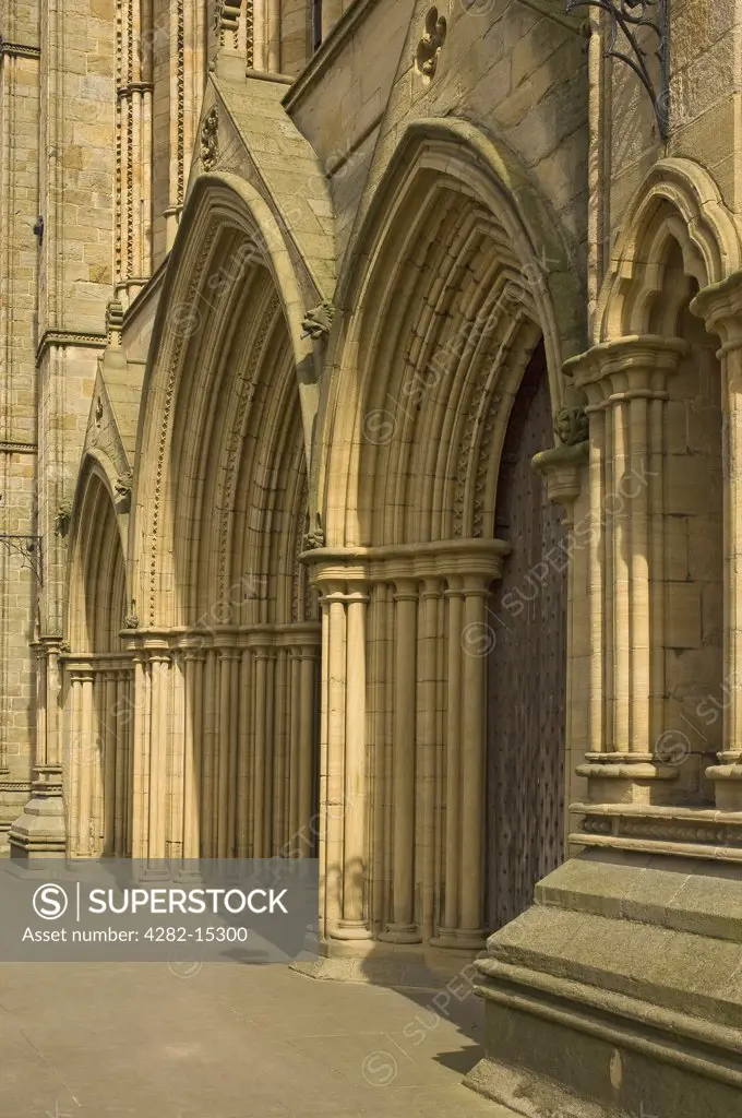 England, North Yorkshire, Ripon. The entrance in the west front of Ripon Cathedral.