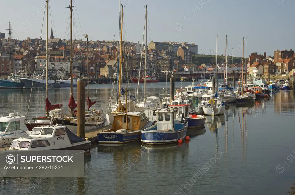 England, North Yorkshire, Whitby. Boats moored in Whitby Harbour.
