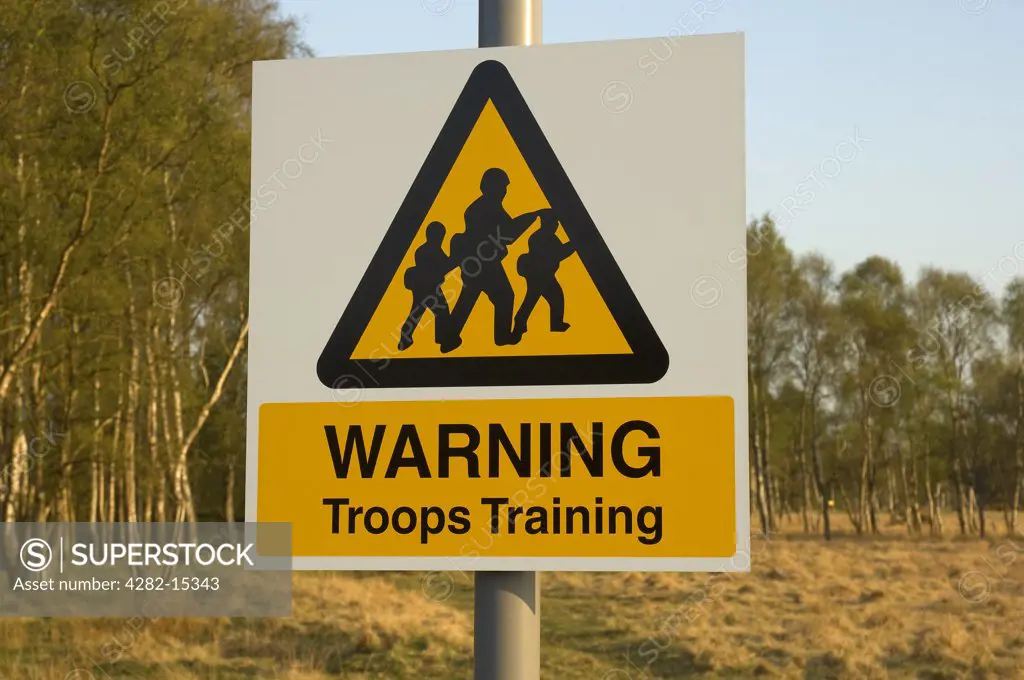 England, North Yorkshire, York. Troops Training warning sign on the common in York.