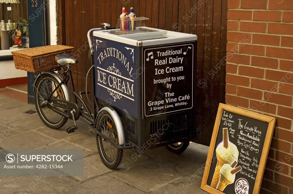 England, North Yorkshire, Whitby. Ice cream seller's tricycle in Whitby.