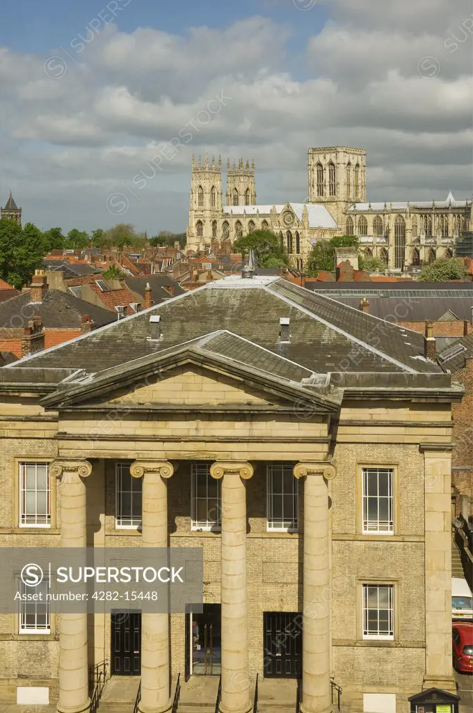 England, North Yorkshire, York. A view over the Central Methodist Church with York Minster in the background.