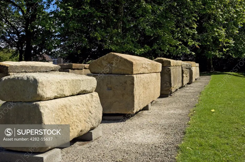 England, North Yorkshire, York. Five Roman stone coffins in the Multangular Tower in the York Museum Gardens.