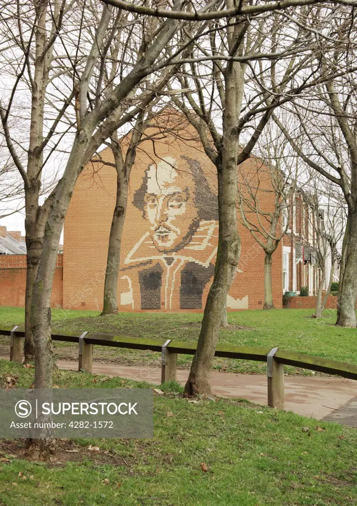 England, Tyne and Wear, Newcastle Upon Tyne. A picture of Shakespeare on the gable end of a row of houses.