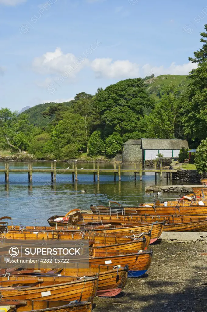 England, Cumbria, Ambleside. Rowing boats for hire on the shore of Lake Windermere in Ambleside.