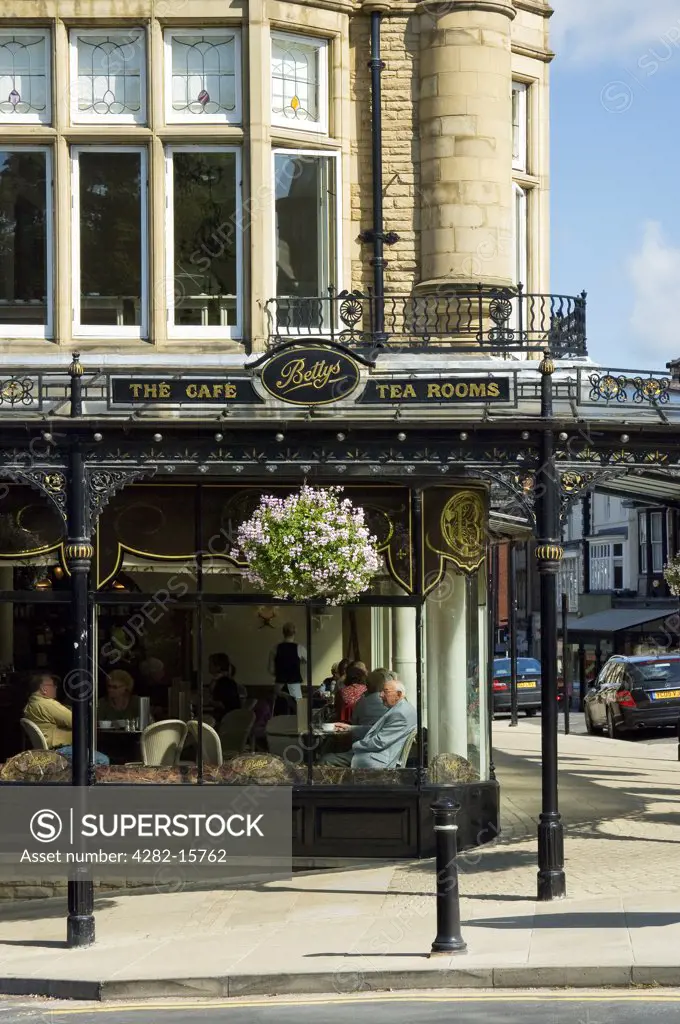 England, North Yorkshire, Harrogate. Bettys tea rooms and cafe on the corner of Parliament Street and Montpellier Parade in Harrogate.
