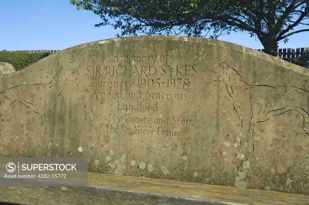 England, East Riding of Yorkshire, Sledmere. Stone seat commemorating Sir Richard Sykes near the village of Sledmere.