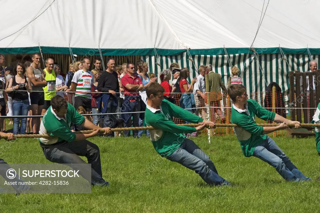 England, North Yorkshire, Gargrave. Spectators watching the tug of war competition at Gargrave Show, an annual country show near Skipton.