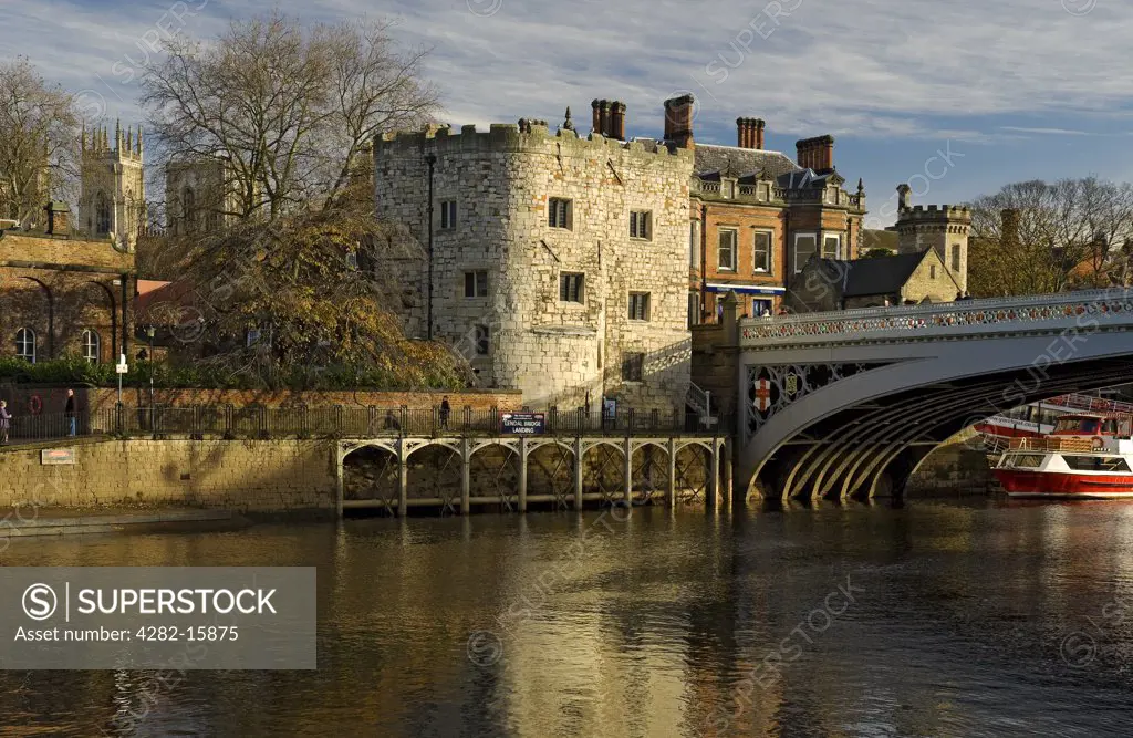 England, North Yorkshire, York. Lendal Tower and Lendal Bridge with York Minster in the background.