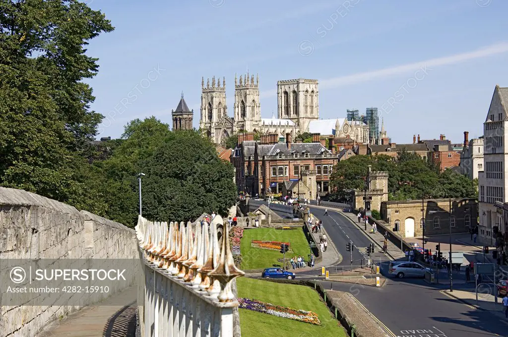 England, North Yorkshire, York. A view along the city walls towards York Minster in the background.