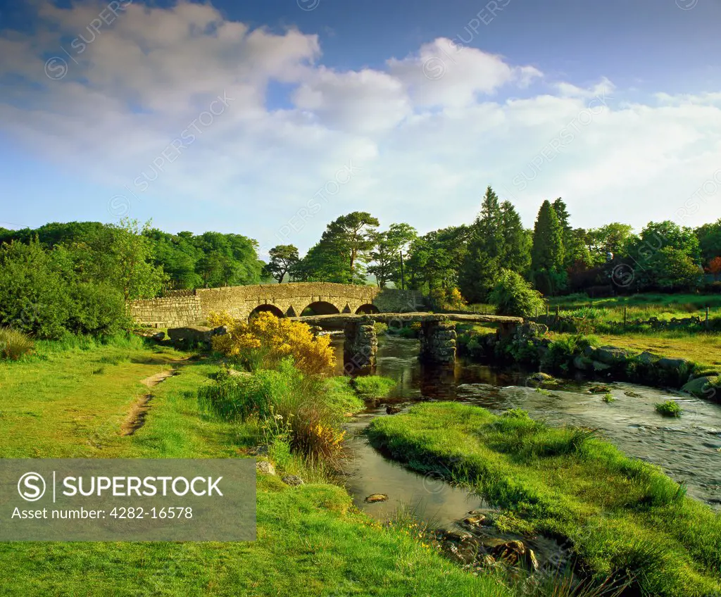 England, Devon, Postbridge. This medieval clapper bridge is the largest in Dartmoor National Park and crosses the East Dart River at Postbridge.