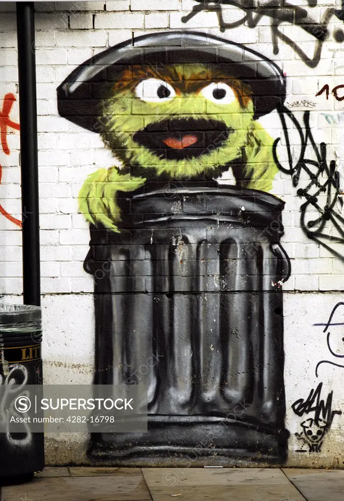 England, London, Whitechapel. Urban grafitti located In East London. The Sesame Street character featured is Oscar the Grouch.