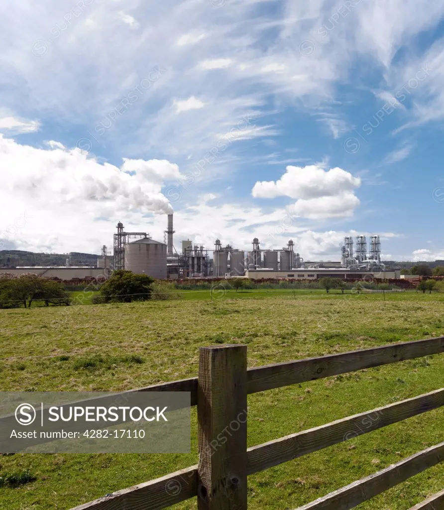 England, Northumberland, Hexham. A manufacturing plant surrounded by lush green countryside.