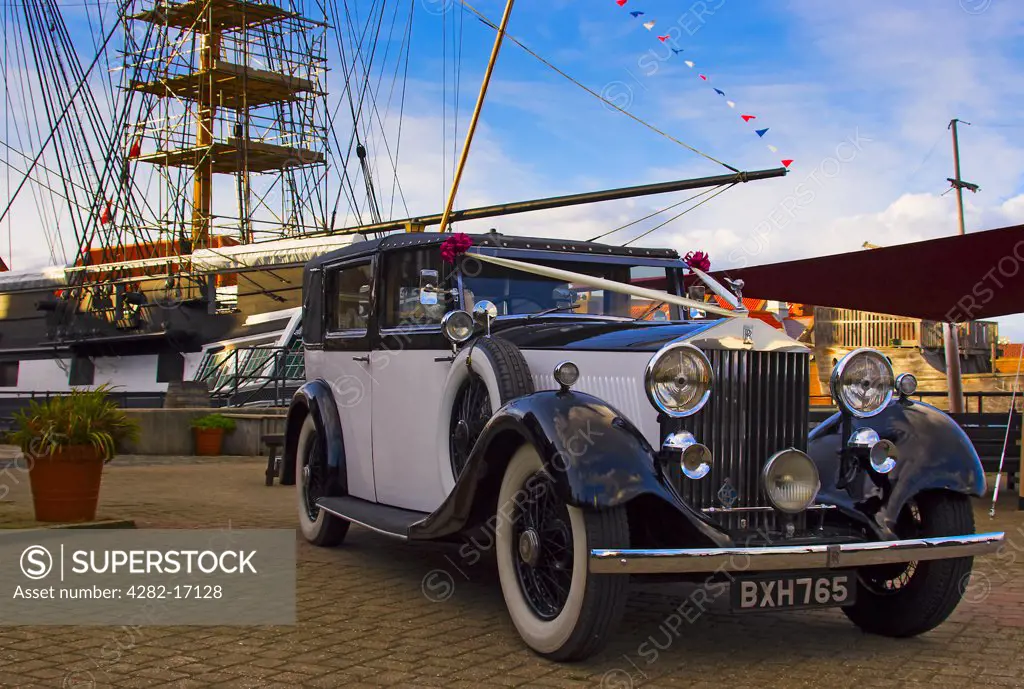 England, County Durham, Hartlepool. A vintage Rolls Royce decorated with wedding ribbons on the Historic Quay at Hartlepool's Maritime Experience.