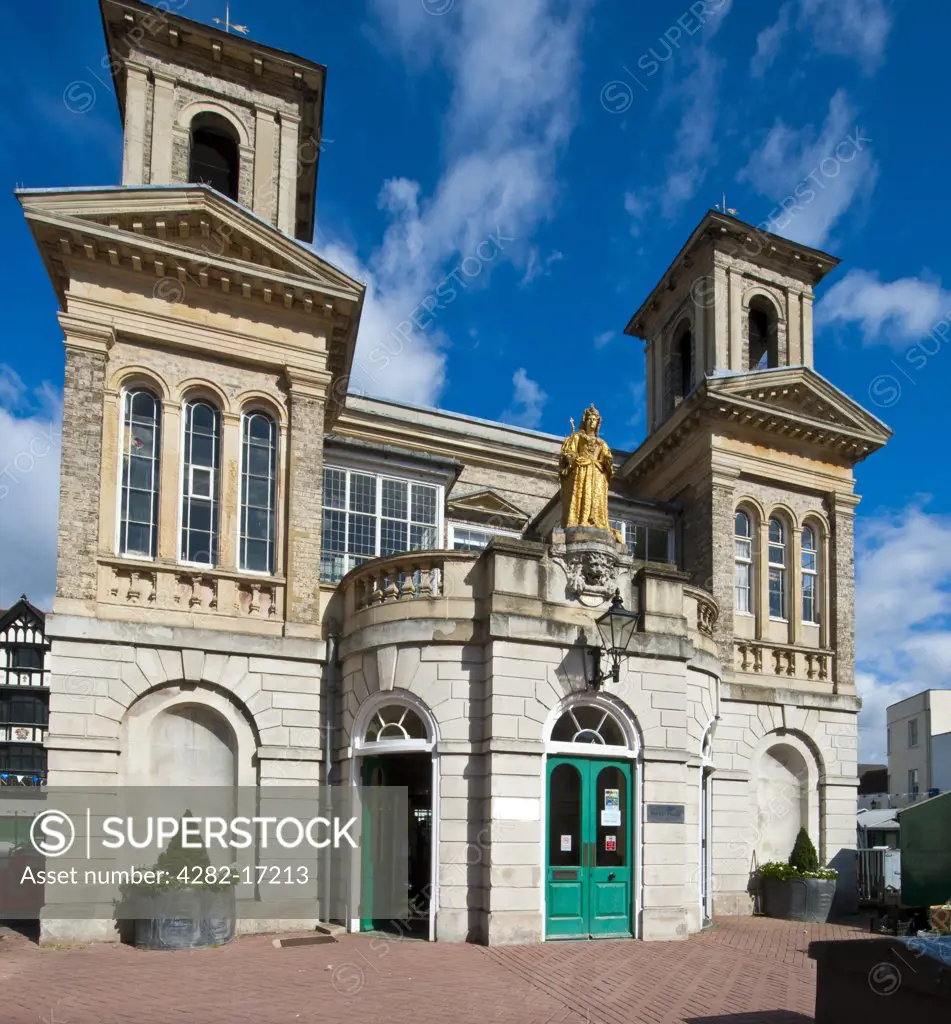England, Surrey, Kingston Upon Thames. The tourist information centre housed in Market House in the middle of the market place. The Victorian building features a gilded statue of Queen Anne.