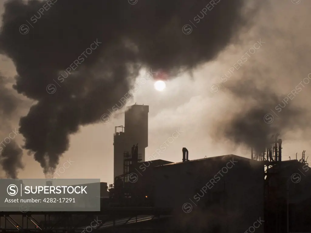 England, County Durham, Billingham. Smoke billowing out from chimneys at the Billingham chemical complex.