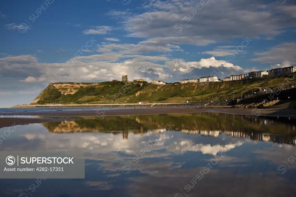 England, North Yorkshire, Scarborough. Scarborough Castle on a promontory overlooking North Bay.