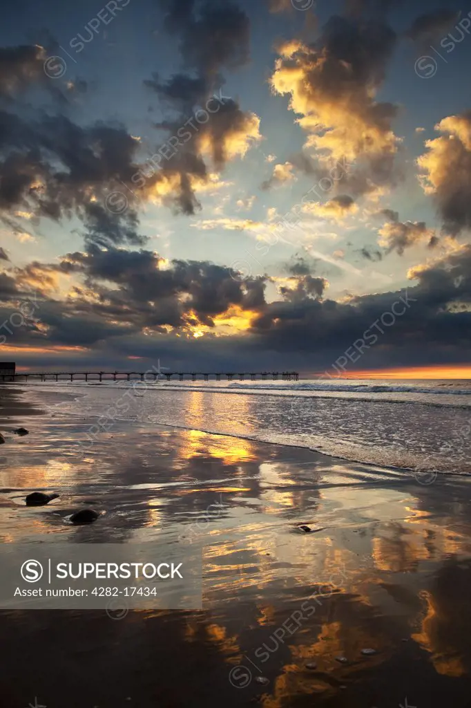England, Redcar & Cleveland, Saltburn-By-The-Sea. Sunset over the Victorian pier at Saltburn-By-The-Sea.