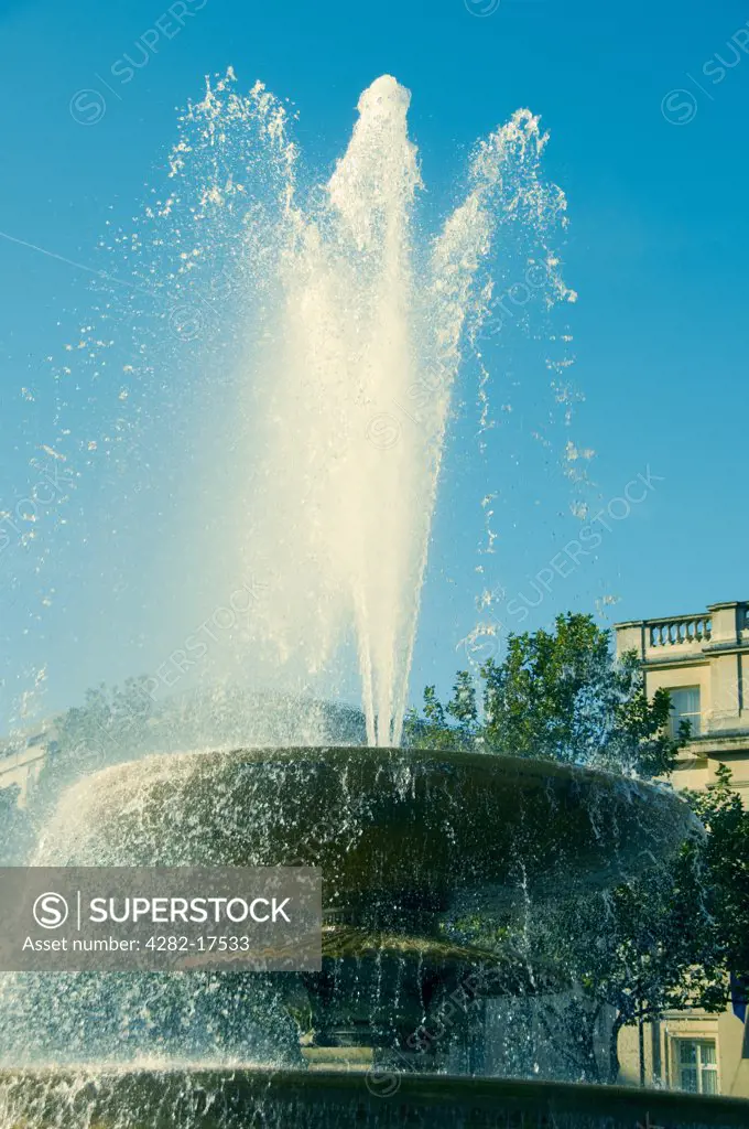 England, London, Trafalgar Square. A water fountain in Trafalgar Square.