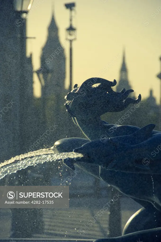 England, London, Trafalgar Square. A plume of water projecting from a fountain in Trafalgar Square.