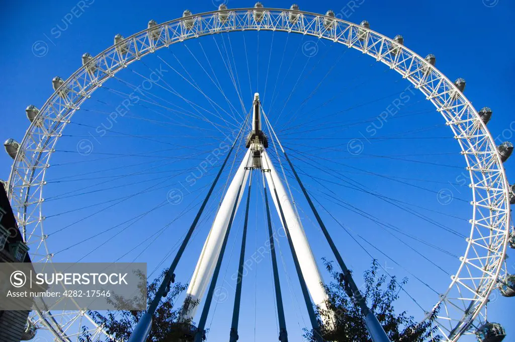 England, London, South Bank. The London Eye on the south bank of the River Thames.