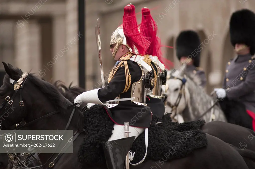England, London, Westminster. Blues and Royals on horseback enter Whitehall from Horseguards Parade during the State Opening of Parliament in central London.