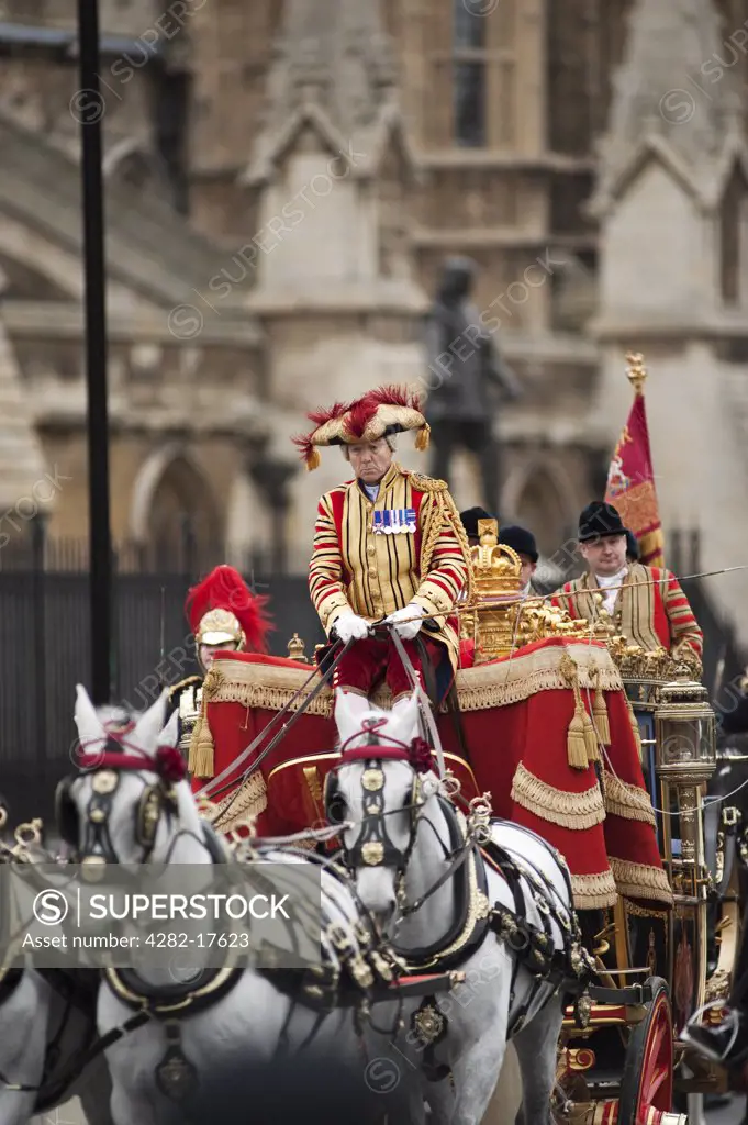England, London, Westminster. The Irish State Coach leaving the palace of Westminster after the State Opening of Parliament in central London.