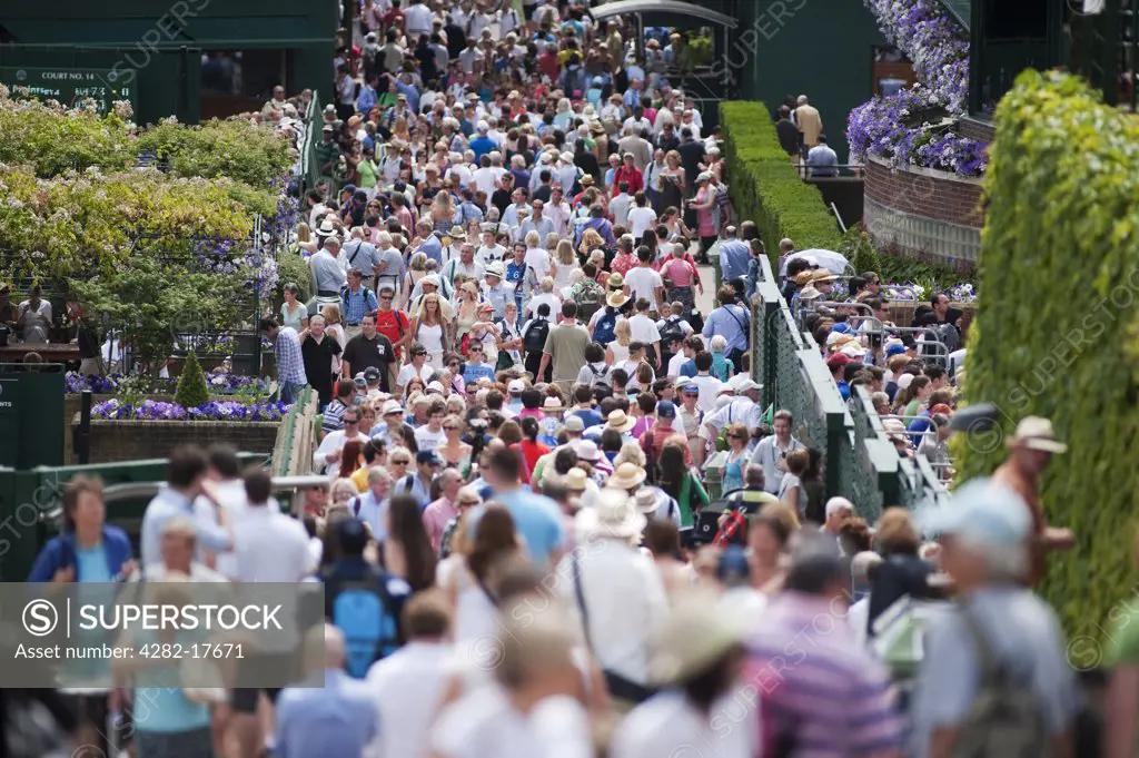 England, London, Wimbledon. Crowds of spectators at the Wimbledon lawn tennis championships in London.