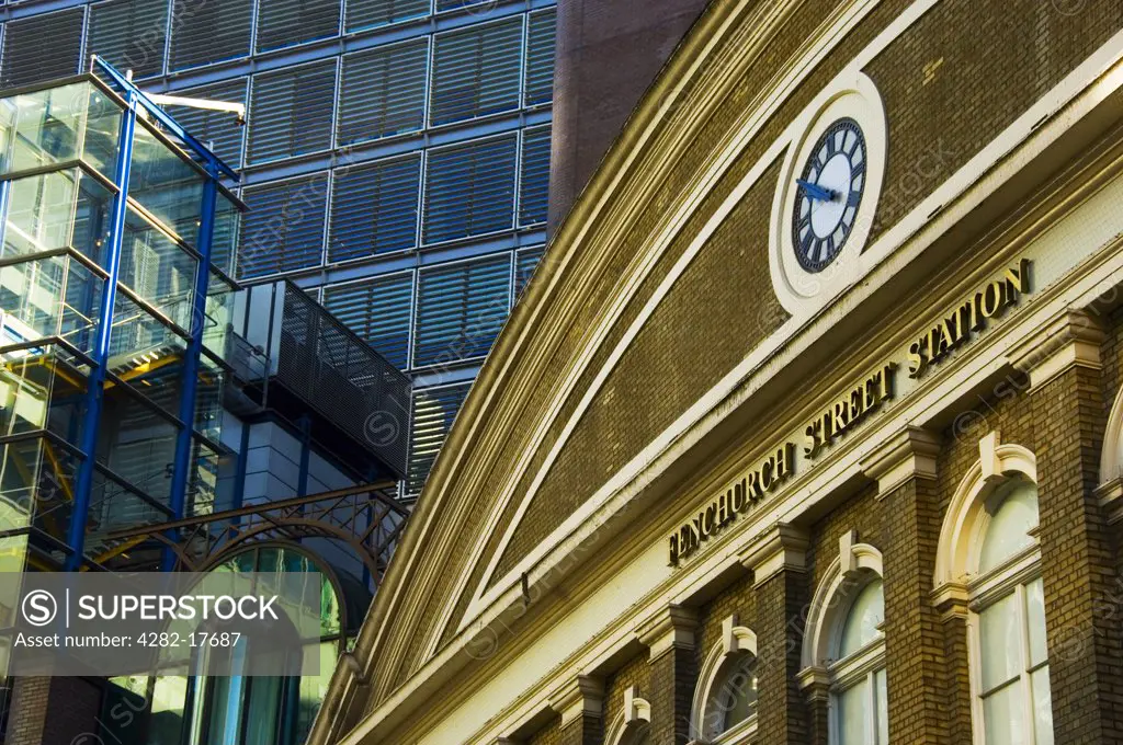 England, London, City of London. The traditional facade of Fenchurch Street Station in the City of London surrounded by high rise office buildings.