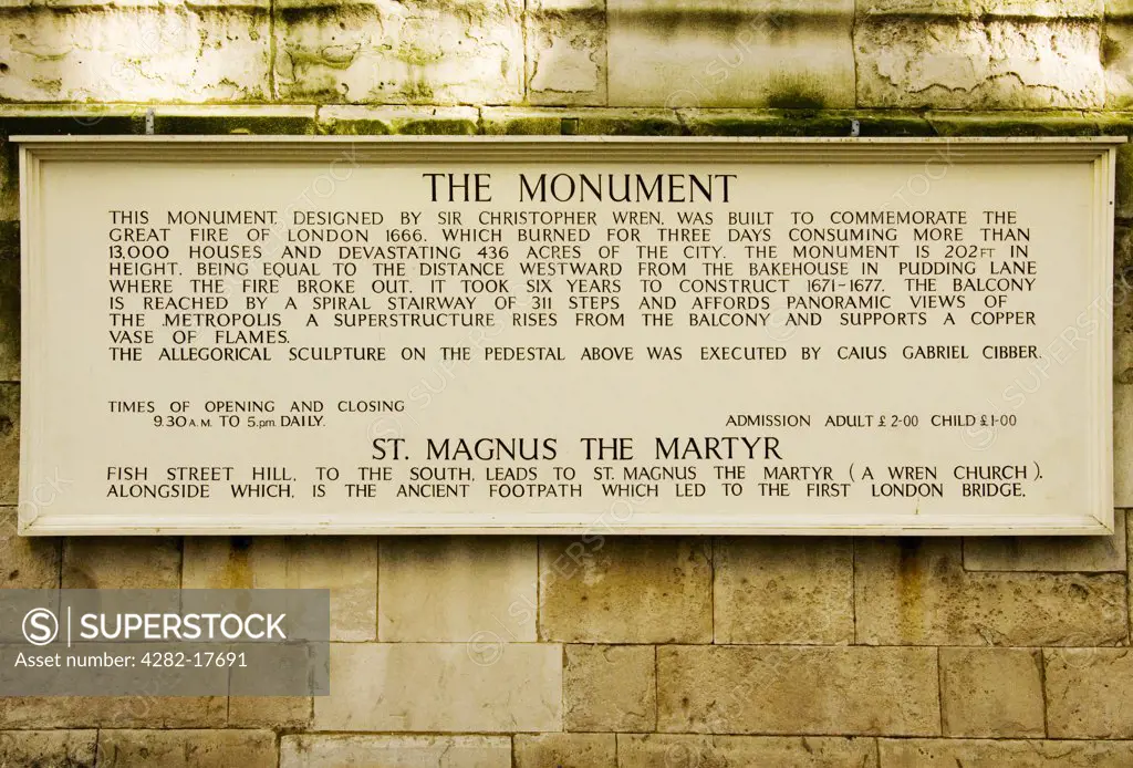 England, London, City of London. Information sign on the plinth at the base of the Monument to the Great Fire of London, designed by Sir Christopher Wren.