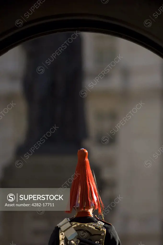 England, London, Whitehall. Rear view of a guard in the Blues and Royals regiment on sentry duty in Whitehall, central London.