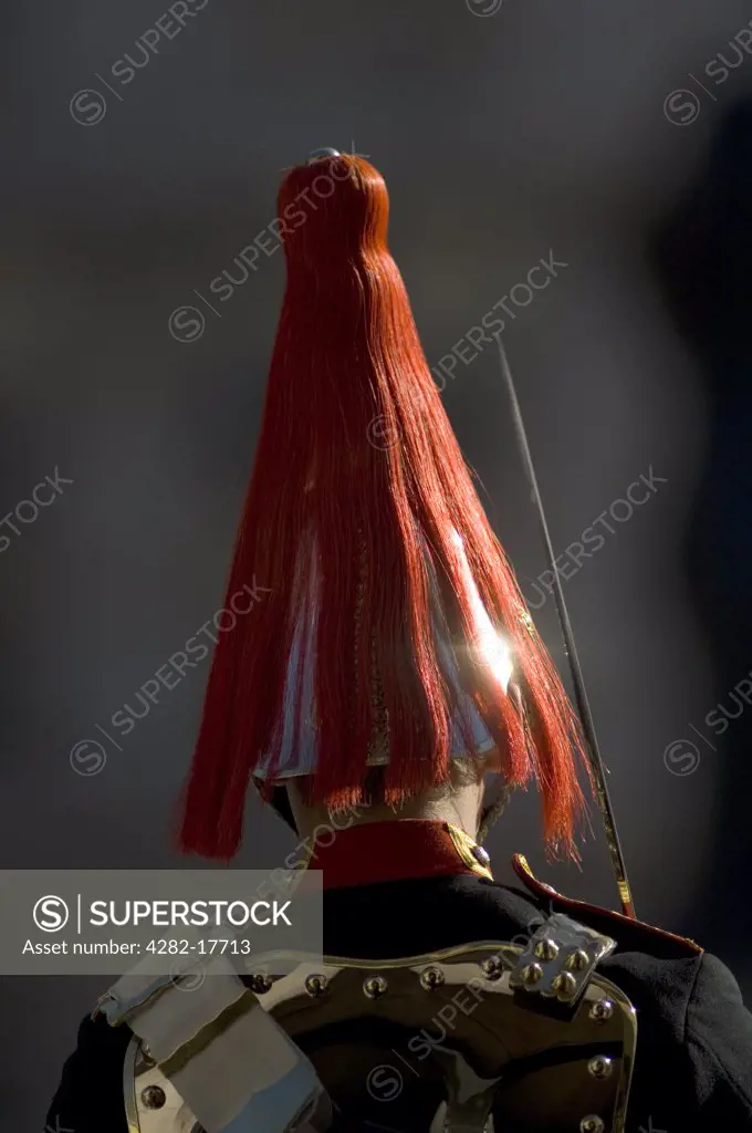 England, London, Whitehall. The plumed helmet of a guard in the Blues and Royals regiment on sentry duty in Whitehall, central London.