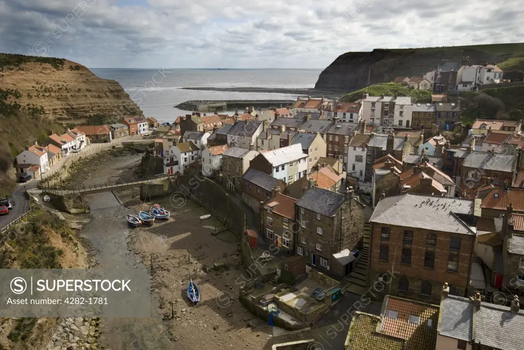 England, North Yorkshire, Staithes. A view over the traditional fishing village of Staithes from the northern cliff side.