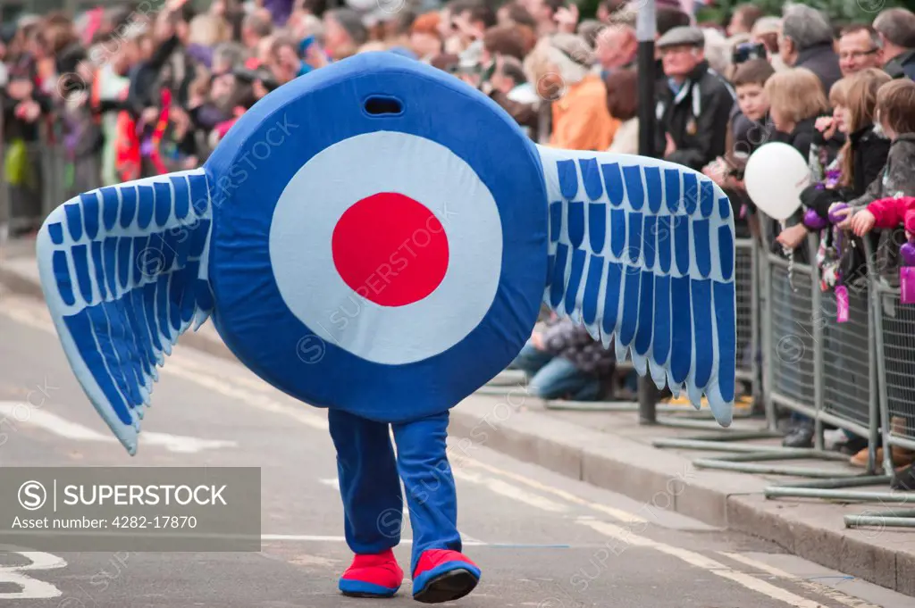 England, London, City of London. Royal Air Force roundel and wings costume worn by a person parading in front of spectators at the annual Lord Mayor's Show in the City of London.