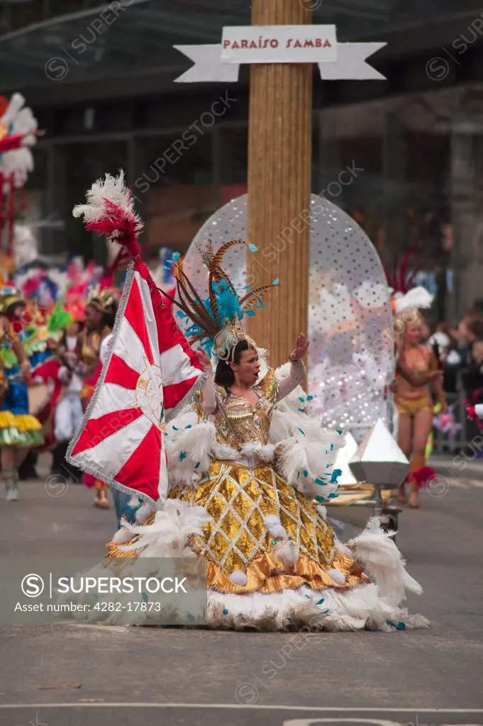 England, London, City of London. The London School of Samba parading to the theme of Gods, Myths and Monsters at the annual Lord Mayor's Show in the City of London.