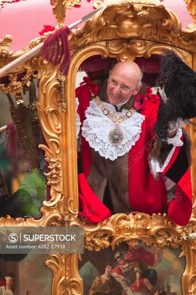 England, London, City of London. The ornate 18th century state coach carrying The Lord Mayor of the City of London, Alderman Michael Bear, in the procession at the Lord Mayor's Show in the City of London.