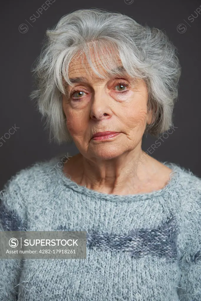 Studio Portrait Of Senior Woman