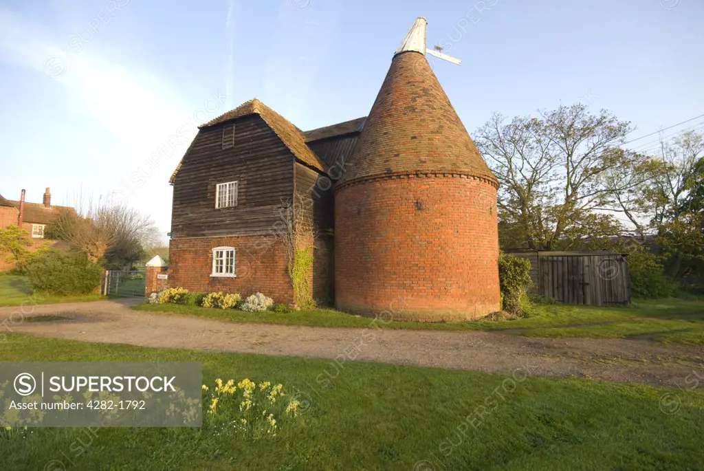 England, Kent, Reculver. An exterior view of the traditional oast house near Reculver in Kent.