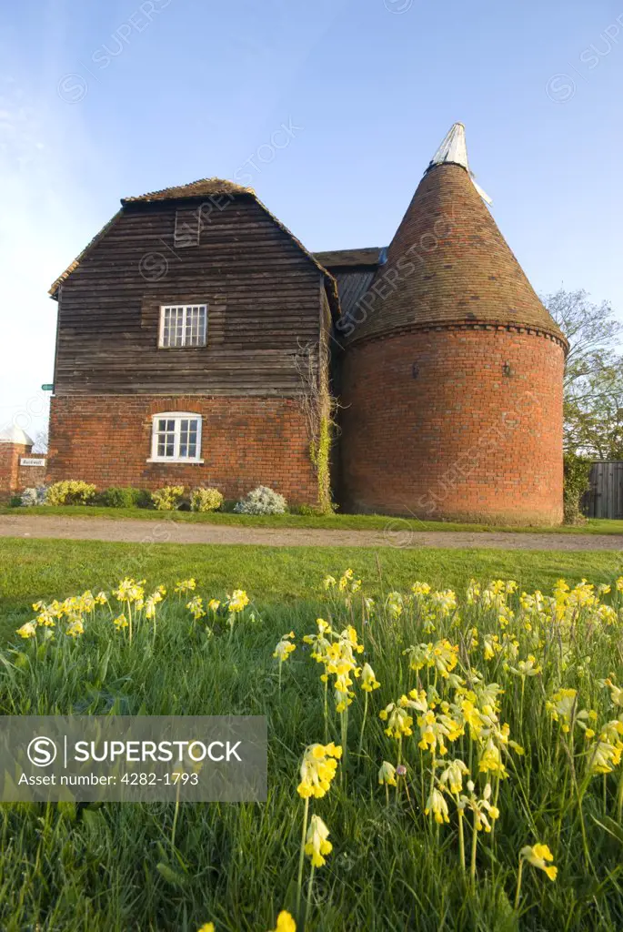 England, Kent, Reculver. An exterior view of the traditional oast house near Reculver in Kent.