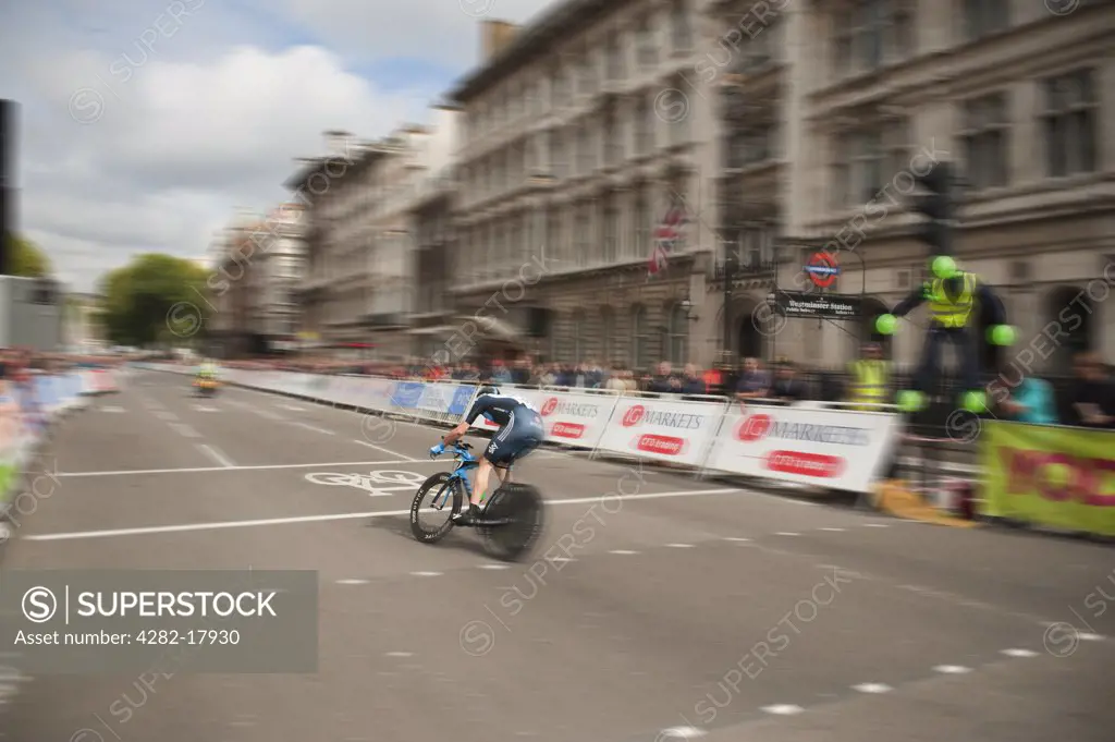 England, London, Westminster. Mathew Hayman of Sky Professional Cycling Team speeds down the finishing straight in Whitehall on the Tour of Britain 2011 Stage 8a time trial.