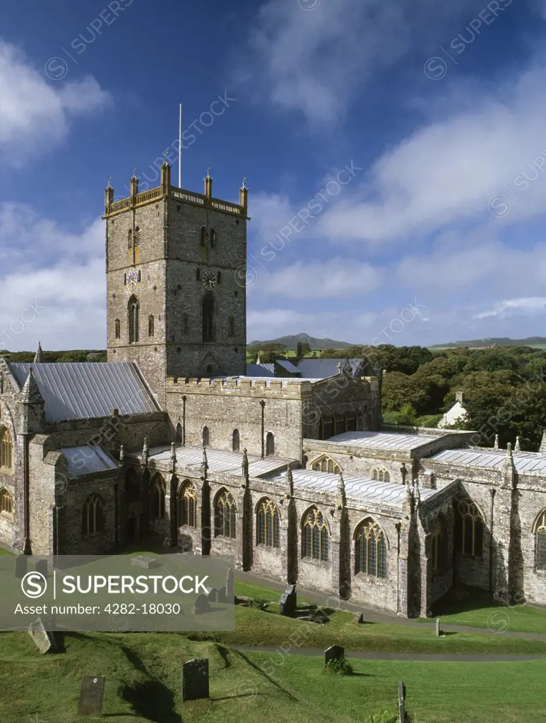 Wales, Pembrokeshire, St David's. A general view of the exterior of St David's Cathedral looking NW towards the peak of Carn Llidi. Restored in 1863 by Sir G. G. Scott, the cathedral mainly dates from the 12th to 14th centuries.