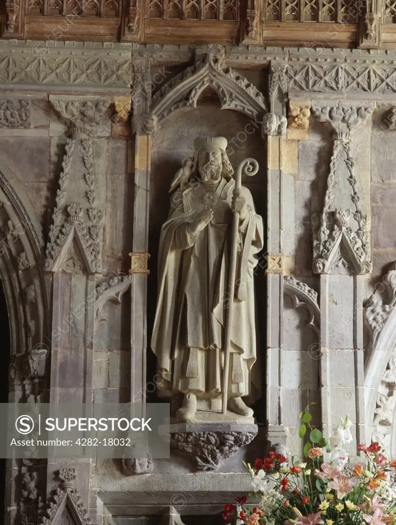 Wales, Pembrokeshire, St David's. A modern statue of St David (Dewi Sant), patron saint of Wales, placed in the 14th-century rood screen between the nave and choir of St David's Cathedral.