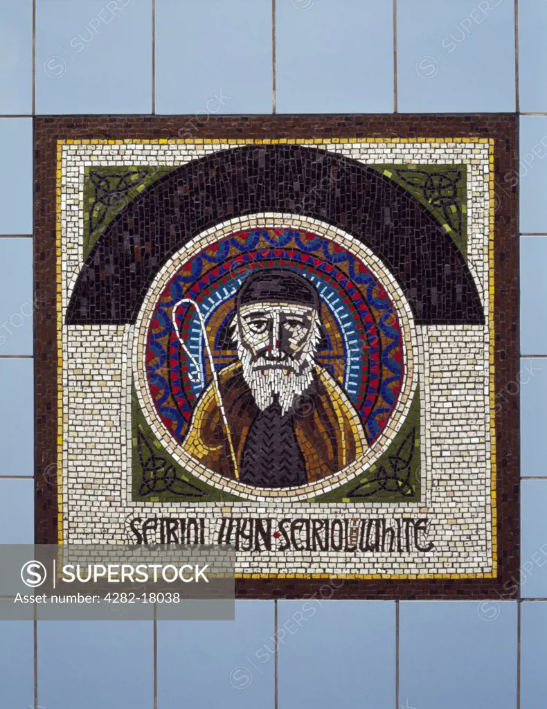 Wales, Anglesey, Holyhead. Mosaic of St Seiriol of Penmon, designed by Gary Drostle, at the Market Street entrance to the Celtic Gateway bridge which links the town centre with the railway station and ferry terminal.